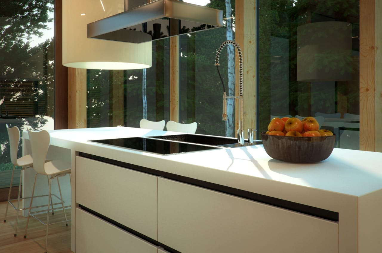 A kitchen with solid surface white counter tops.