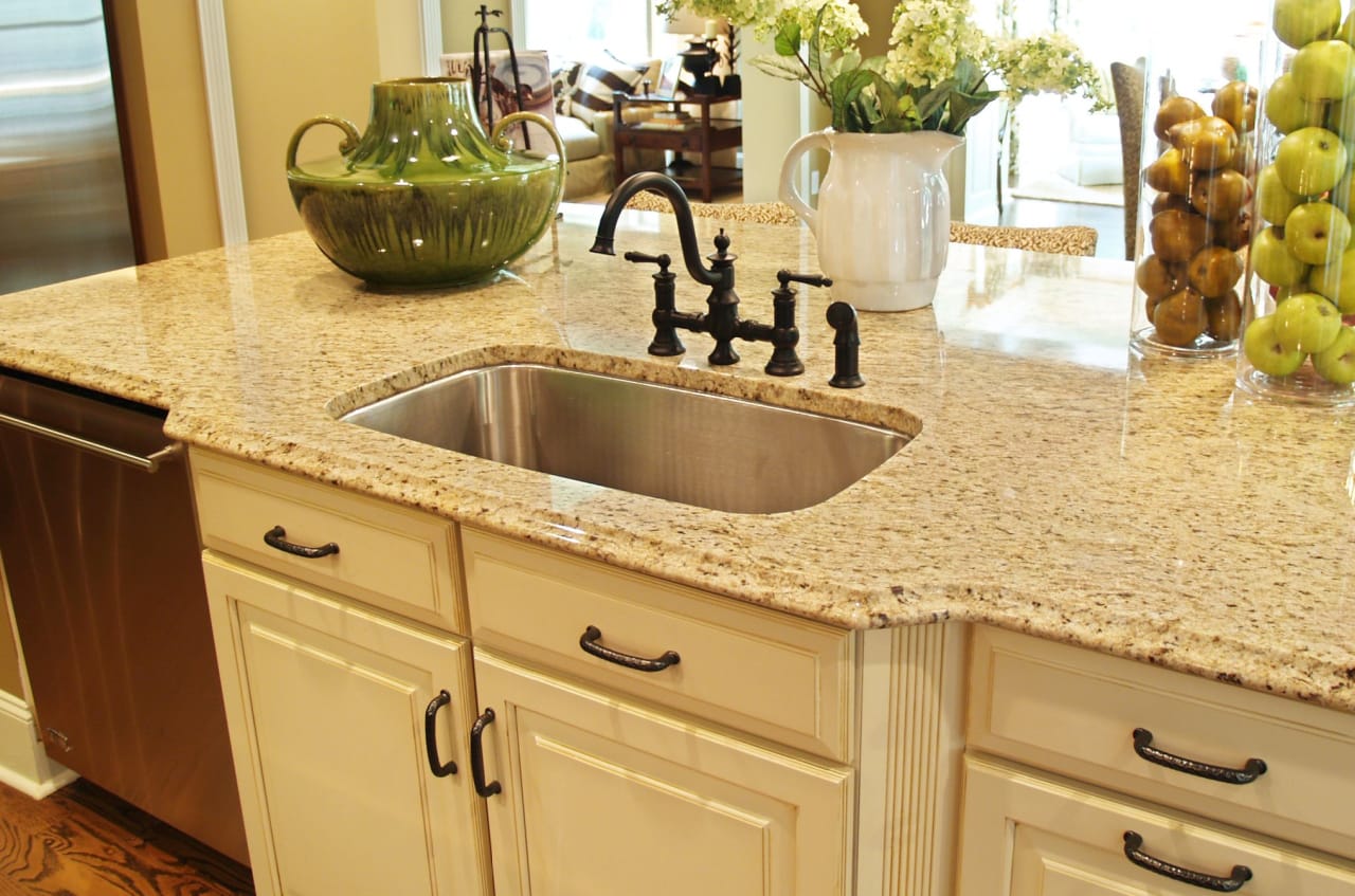 Granite counter tops in a sustainable kitchen.